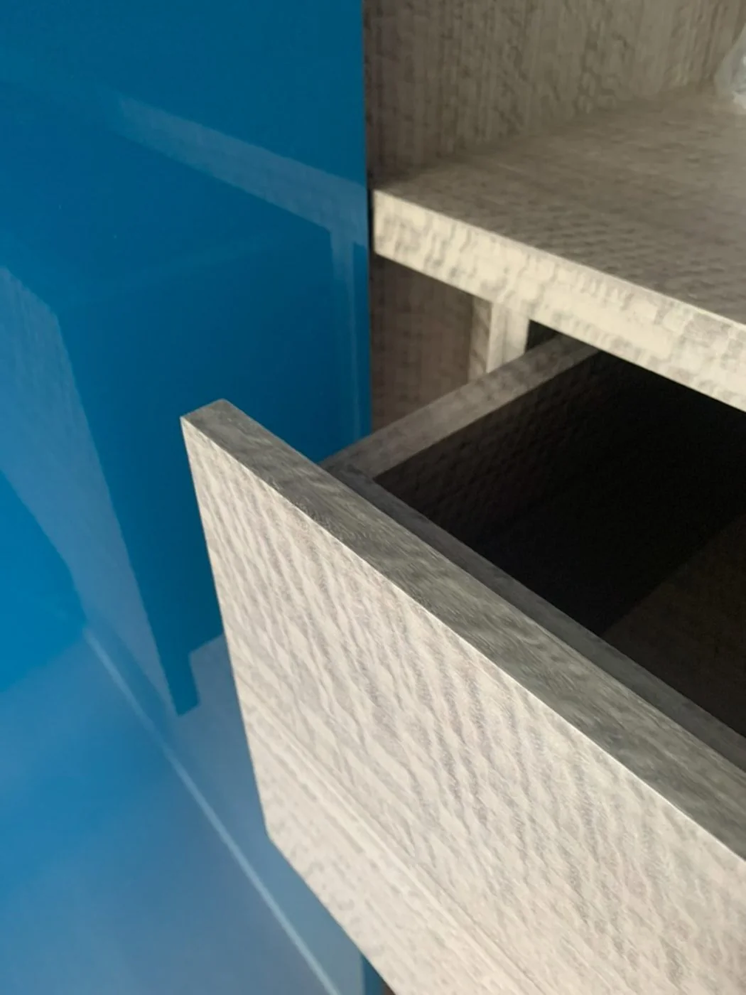 Blue lacquer cabinet with Silvered Eucalyptus drawer interior